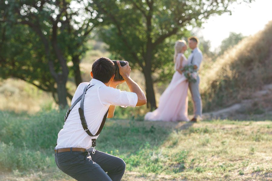 Professional Services Insurance - Wedding Photographer Capturing the Perfect Shot